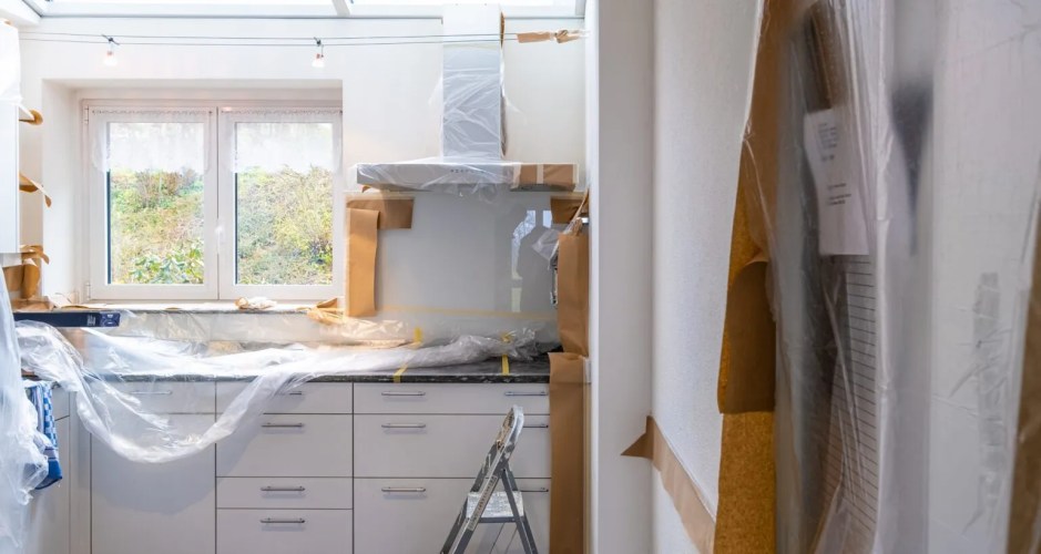 A kitchen is being remodeled. A kitchen is being remodeled.